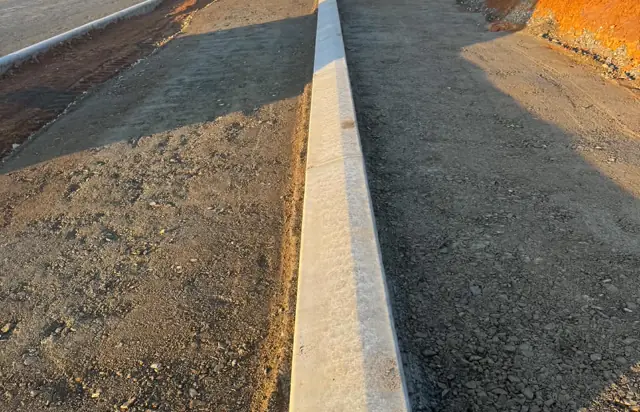 Newly poured kerbing through a residential subdivision
